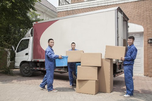 Packed boxes and household items ready for removal