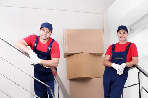 Loading boxes and household items into a moving van