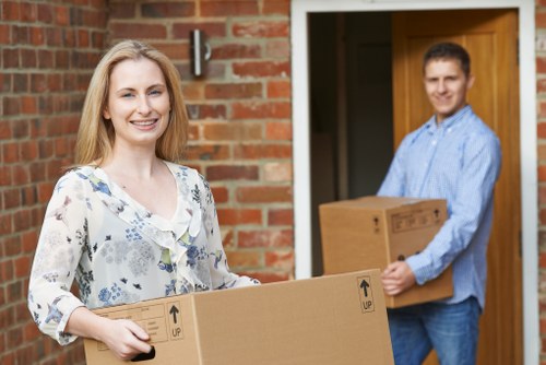 Local removal company handling fragile items during a move