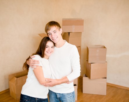 Local moving team handling boxes and furniture in North West London