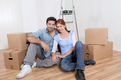 Packed office boxes and equipment prepared for relocation in Golders Green