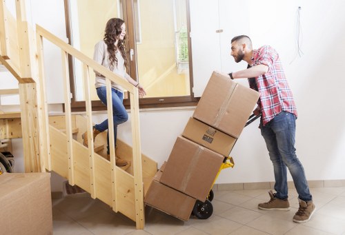 Packed household boxes ready for a local move in Golders Green